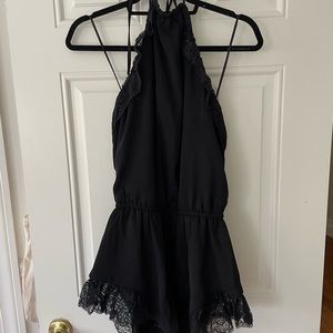 Guess halter top romper with lace detail, size small.